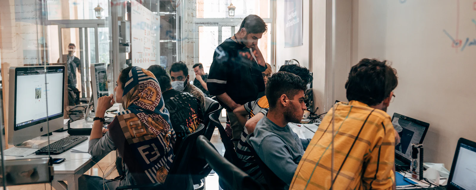 A team working together at computers